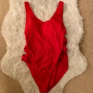 One piece red bathing suite